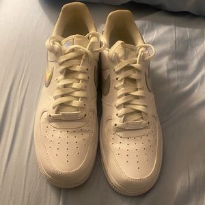 White air forces with silver swoosh. Size 9 in womens.